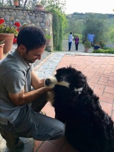 Alessio and his new friend in the organic winery in Tuscany - wine tour in Chianti - Km Zero Tours - Slow Travel Tuscany-225x300
