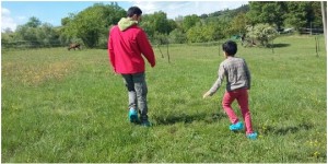 Alessio playing hide and seek with the sweet baby goats together with the lovely guest of Km Zero Tours - Holidays in Tuscany